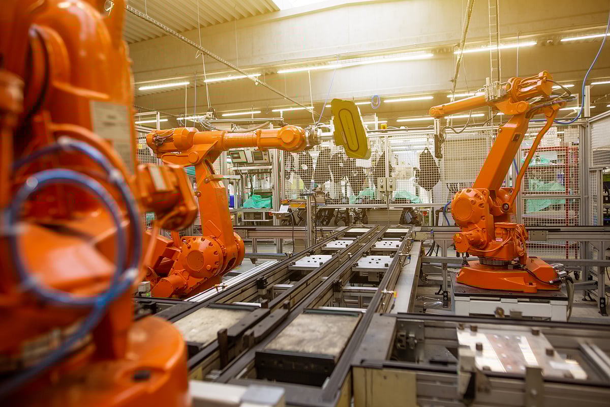 <div class="paragraphs"><p>Robotic arms at a manufacturing facility. (Photo: Simon-Kadula/&nbsp; Unsplash)</p></div>