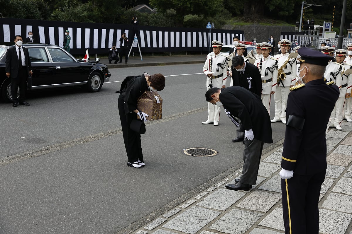 Akie Abe bows to Fumio Kishida, as she arrives at the state funeral of her husband at the Nippon Budokan.Photographer: Kiyoshi Ota/Bloomberg