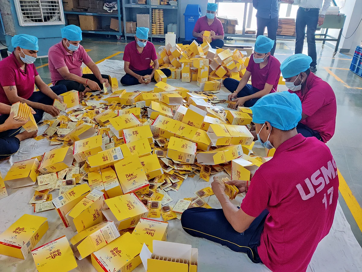<div class="paragraphs"><p>Factory workers packing the final product into boxes. (Source: BQ Prime)</p></div>