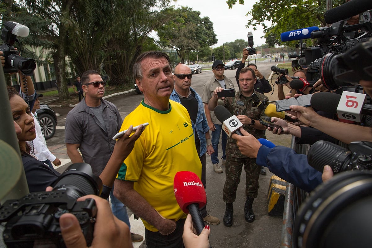 Bolsonaro speaks to the media outside a polling station in Rio de Janeiro, Brazil, on Oct. 2.Photographer: Pedro Prado/Bloomberg