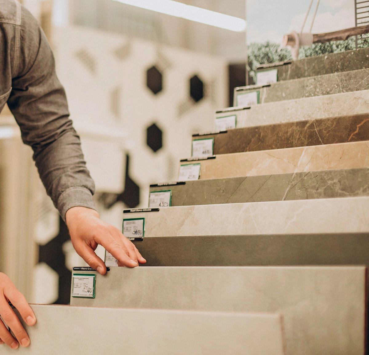 <div class="paragraphs"><p>Close view of a person choosing tiles. (Source: freepik)</p></div>