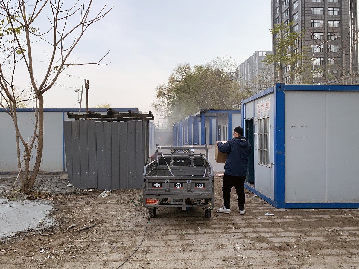 A temporary Covid quarantine facility under construction in Beijing on Nov. 23.Photographer: James Mayger/Bloomberg