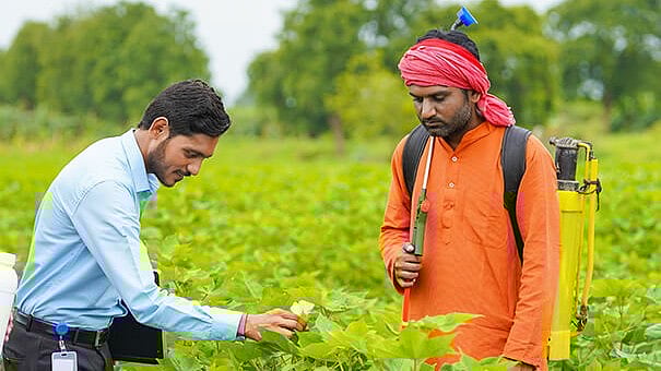 <div class="paragraphs"><p>Rallis India employee demonstrating agri-solution products to farmer. (Source: Company Webiste)</p></div>