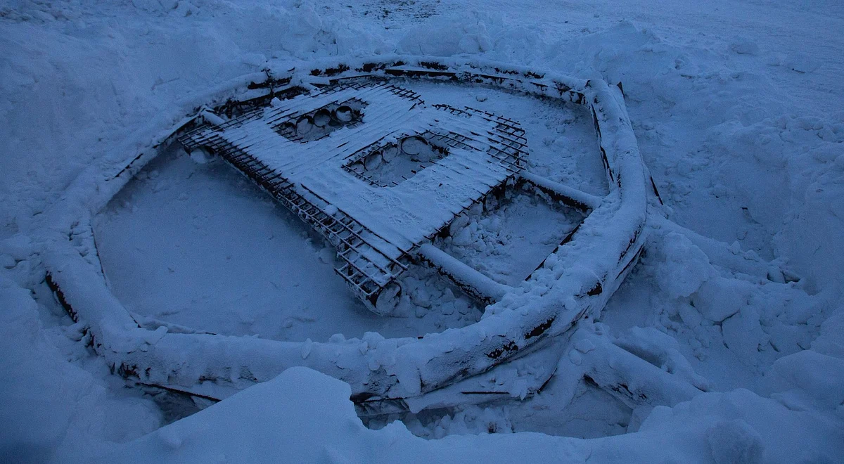A bitcoin sculpture made from scrap metal on the ground outside the BitCluster cryptocurrency mining farm in Norilsk, Russia, on Sunday, Dec. 20, 2020. Norilsk may soon be famous for a different type of mining — it now hosts the Arctic's first crypto farm for producing new Bitcoins. Photographer: Andrey Rudakov/Bloomberg