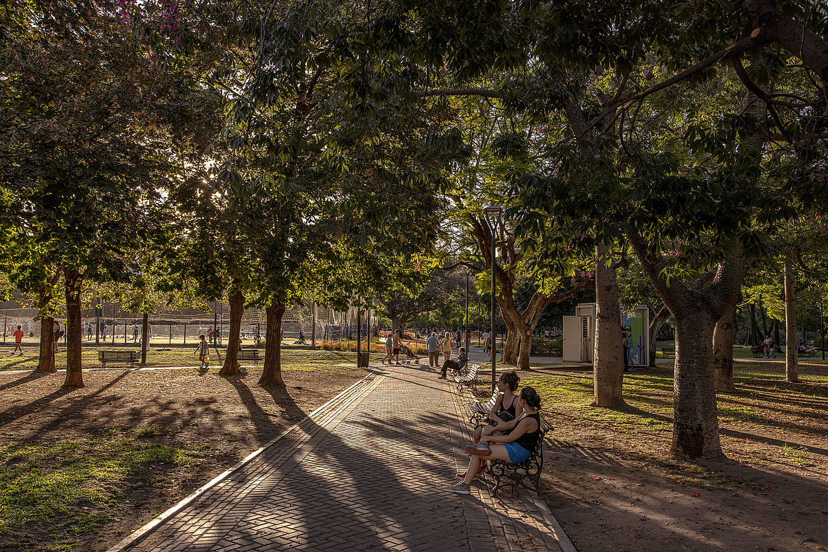 Residents at Las Heras park in the Barrio Norte neighborhood, where Russian can be heard spoken regularly. Photographer: Sarah Pabst/Bloomberg