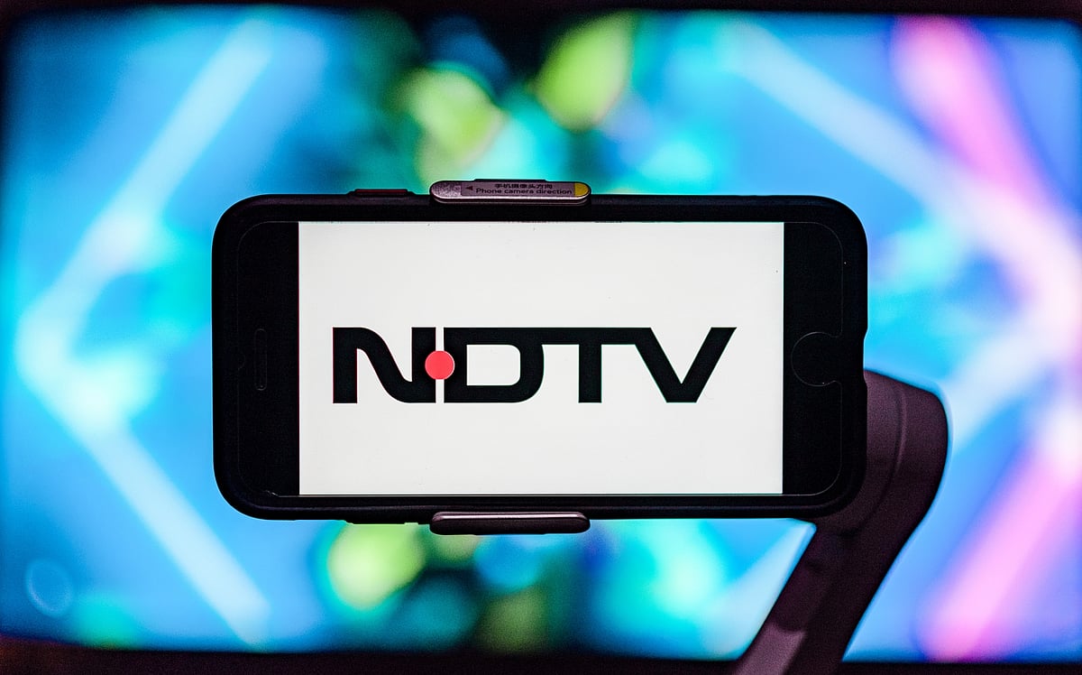 <div class="paragraphs"><p>In this photo illustration, the Indian media news company logo, NDTV, is seen displayed on a mobile phone screen. (Source: Reuters)</p></div>