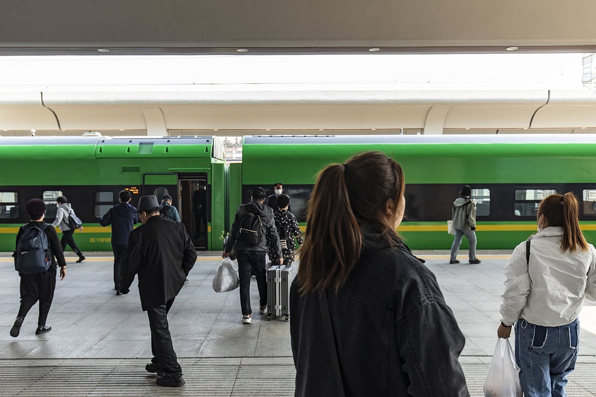 A high speed train destined for the provincial capital of Harbin, at the newly completed station. Photographer: Qilai Shen/Bloomberg