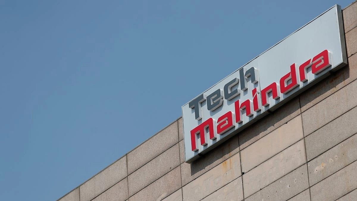 <div class="paragraphs"><p>Tech Mahindra's logo is seen on its office building in Noida. (Photo: Adnan Abidi/Reuters)</p></div>