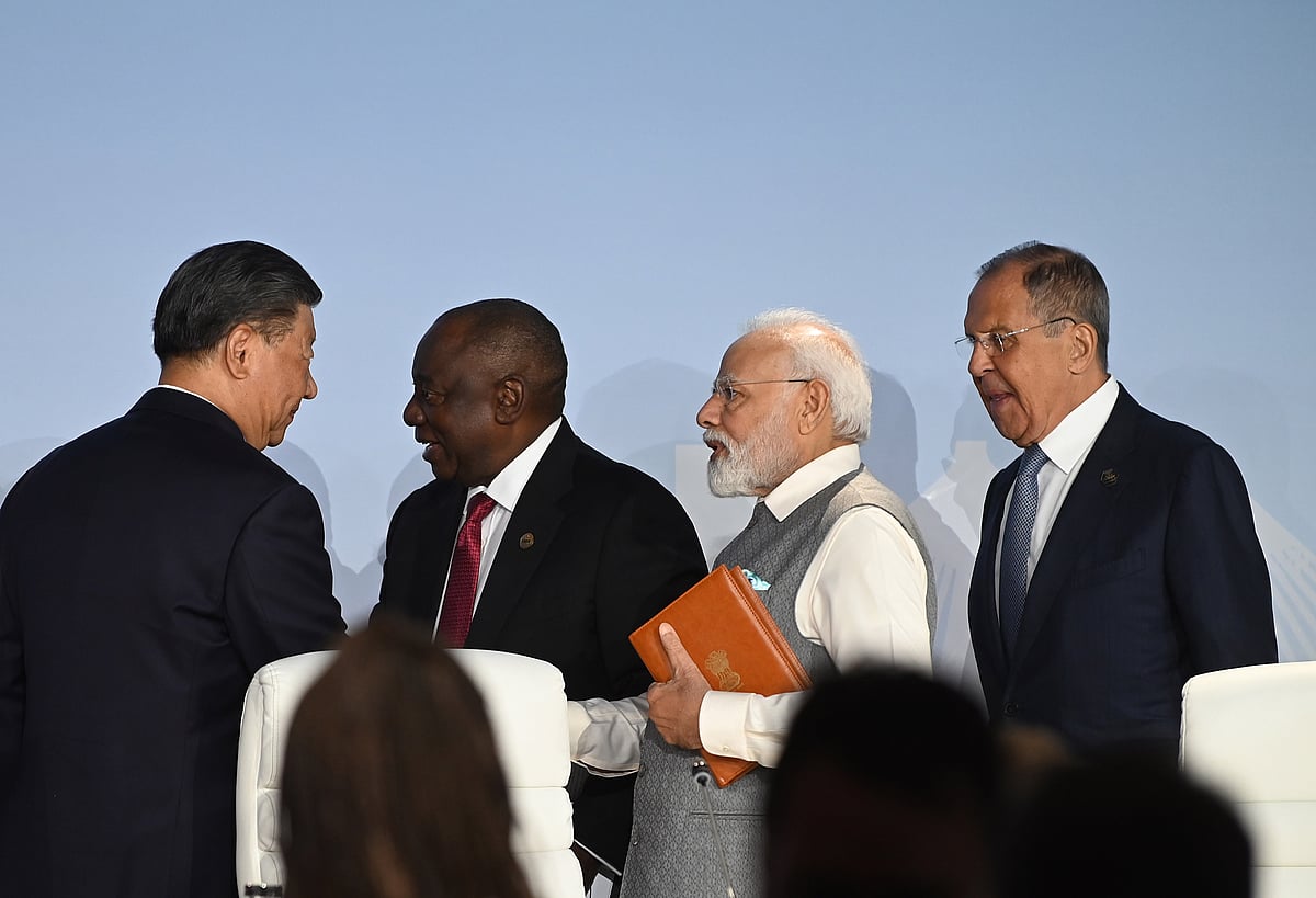 The leaders of China, South Africa, Russia and India meet on the closing day of the BRICS summit in Johannesburg.Photographer: Leon Sadiki/Bloomberg