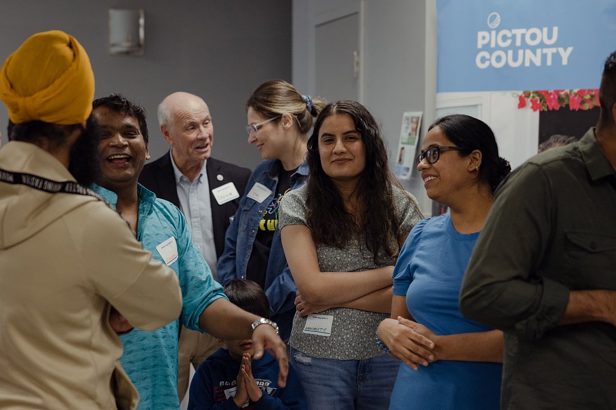 Community members welcome immigrants in New Glasgow, Nova Scotia, in May 2023. Canada’s economy could be at risk if Indians heed a message from their government not to travel to the country.Photographer: Carolina Andrade/Bloomberg
