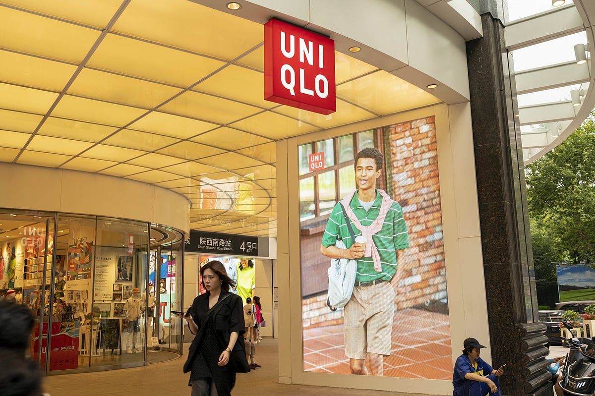 A Uniqlo store in Shanghai, China on Wednesday, June 14, 2023. China’s central bank ramped up its monetary stimulus to help spur the economy amid signs of a slump in business investment and record joblessness among young people.Photographer: Raul Ariano/Bloomberg
