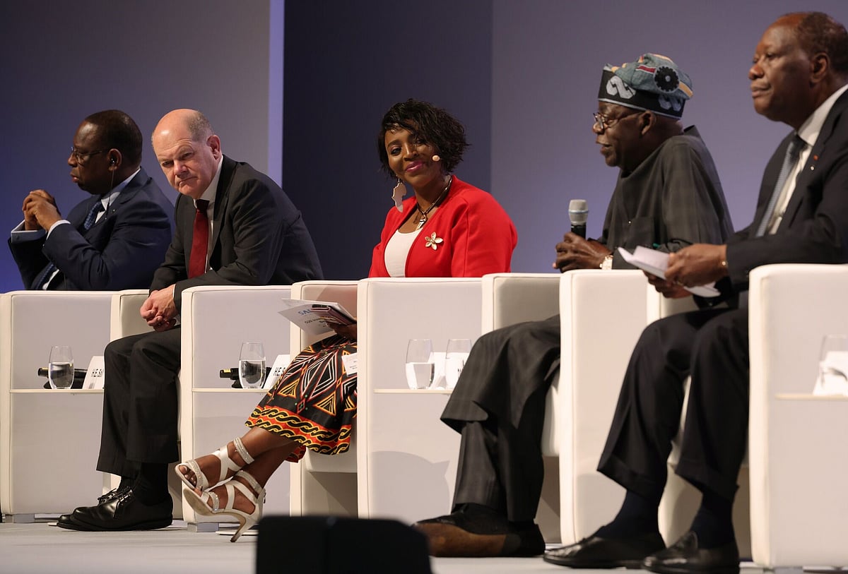 Olaf Scholz, second left, Macky Sall, left, Bola Ahmed Adekunle Tinubu and Alassane Ouattara, right, during the G20 Investment Summit on Nov. 20.