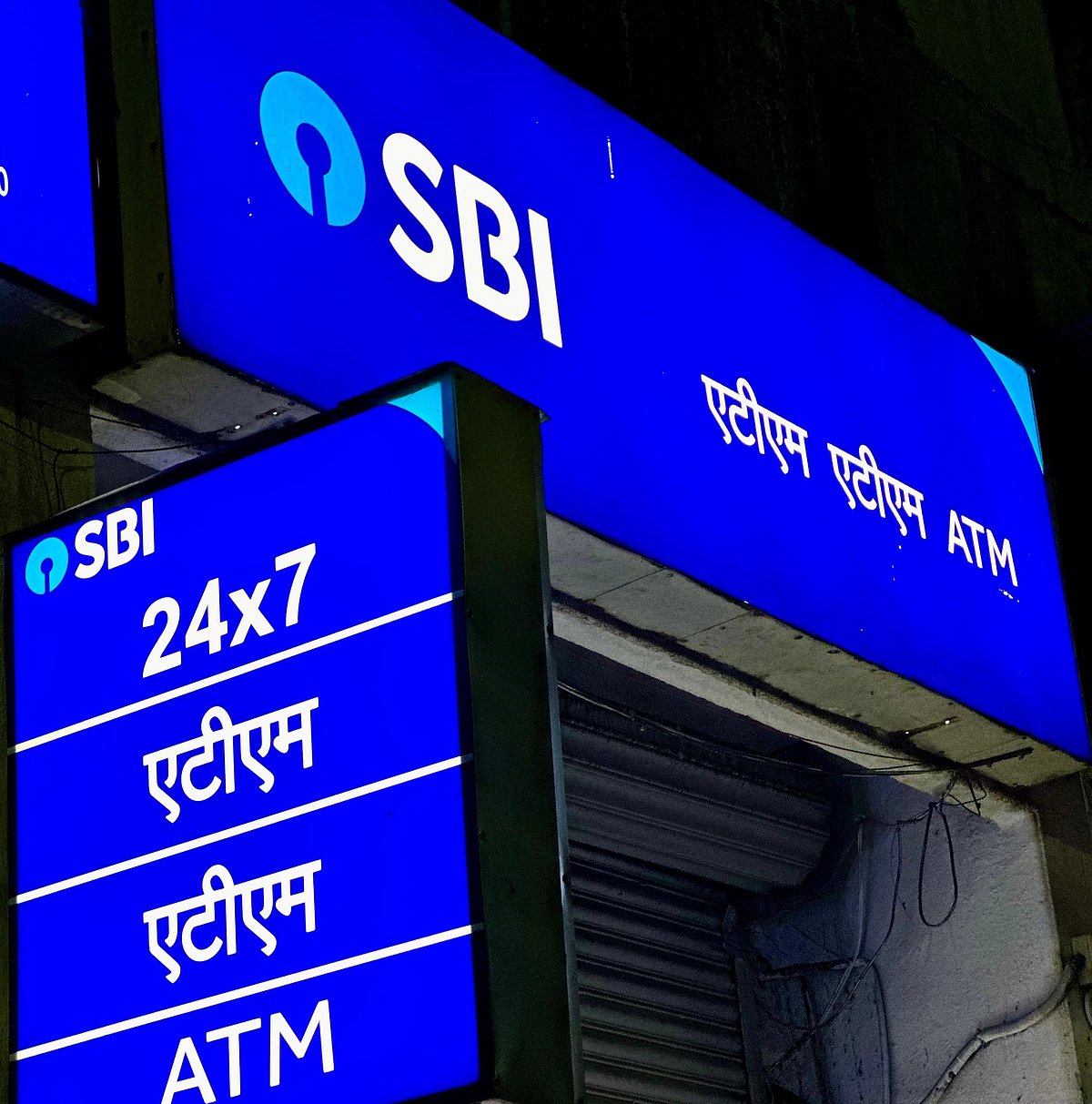 <div class="paragraphs"><p>State Bank of India's illuminated signage. (Photographer: Vijay Sartape Source BQ Prime)</p></div>