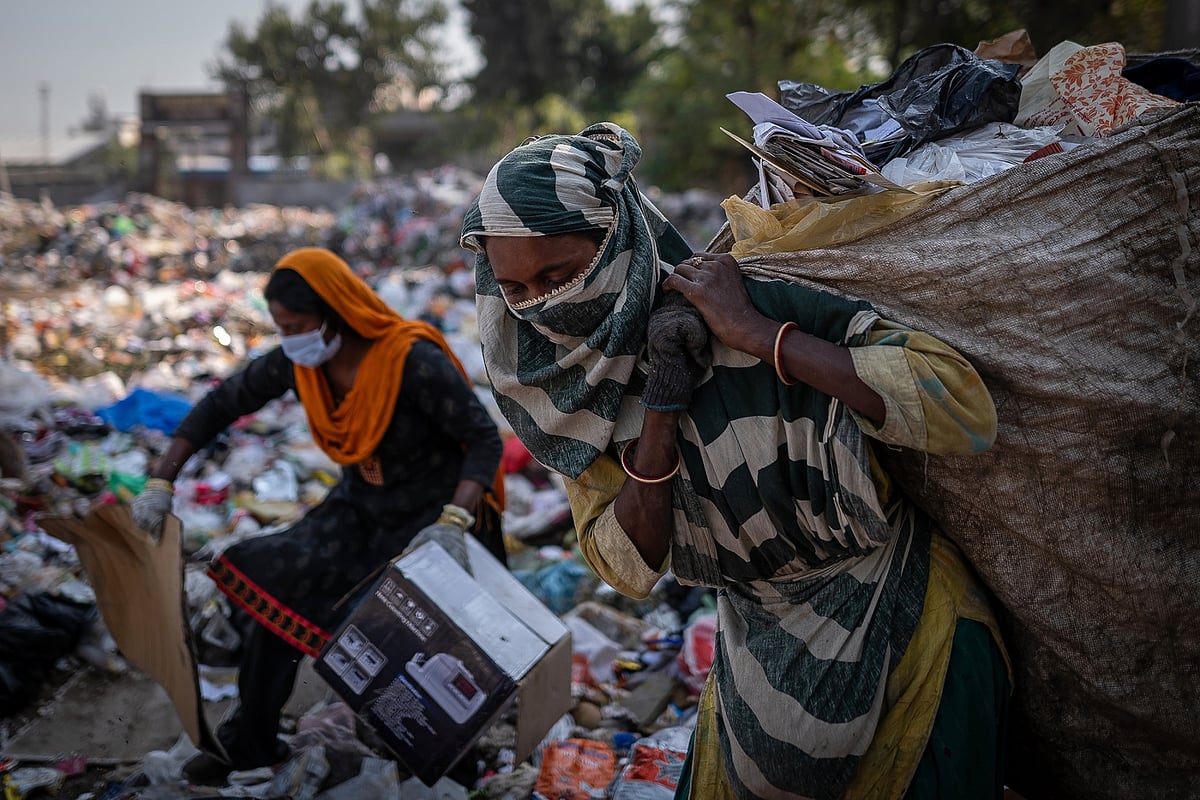 Household waste is sorted at a secondary collection point before it gets transported to JBM Enviro’s plant.Photographer: Anindito Mukherjee/Bloomberg