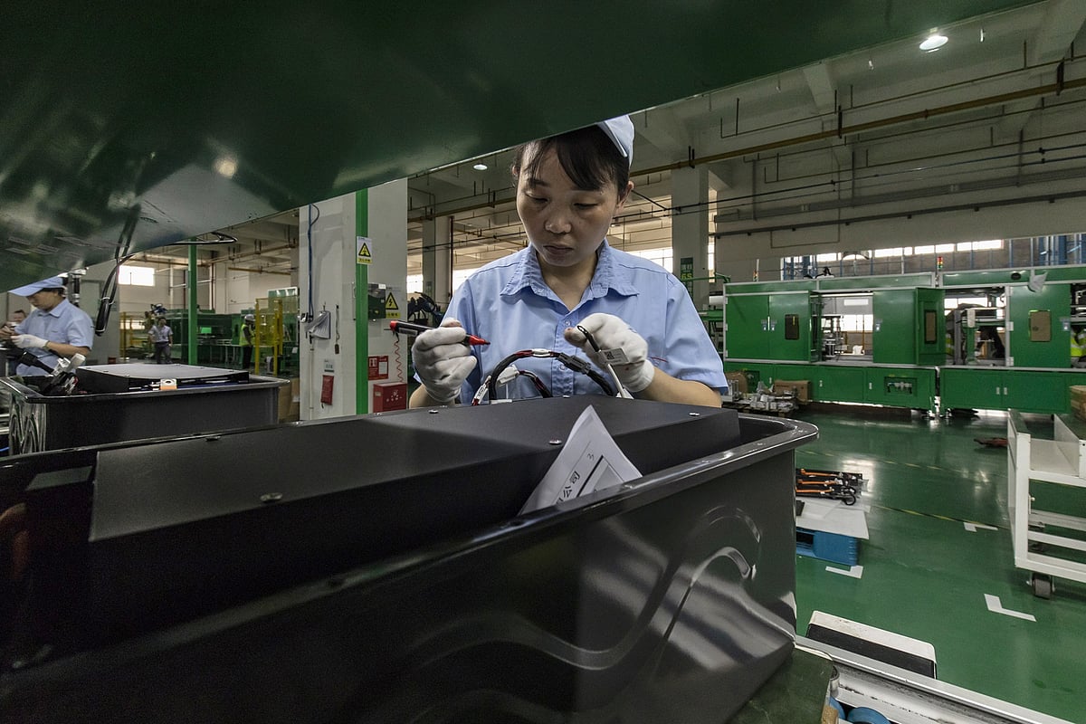 New batteries are assembled for power banks made out of old vehicle batteries via a process known as cascading at GEM’s Wuhan plant.Photographer: Qilai Shen/Bloomberg