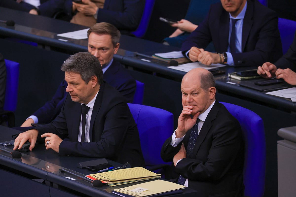 Christian Lindner, Germany’s finance minister, left, Robert Habeck, Germany’s economy and climate minister, center, and Olaf Scholz, Germany’s chancellor, at the Bundestag in Berlin, Germany, on Wednesday, Dec. 13, 2023Photographer: Krisztian Bocsi/Bloomberg