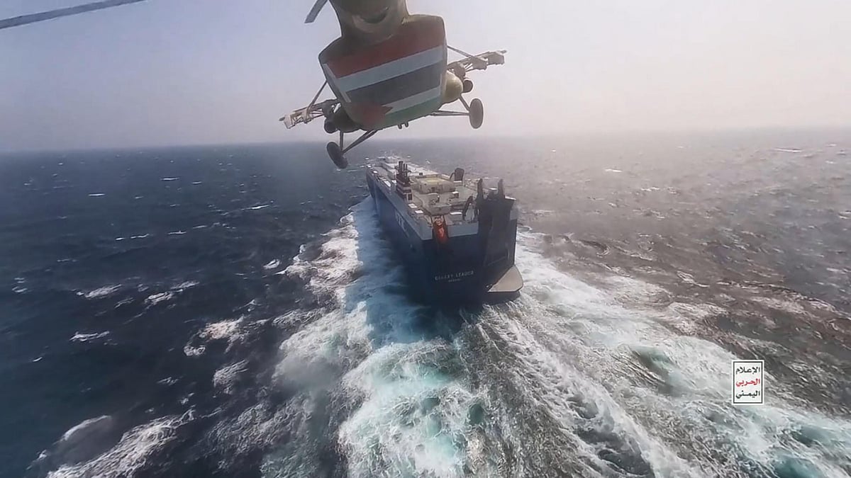 Houthi fighters approach the Galaxy Leader in the Red Sea on Nov. 20.Source: Houthi Movement/Getty Images
