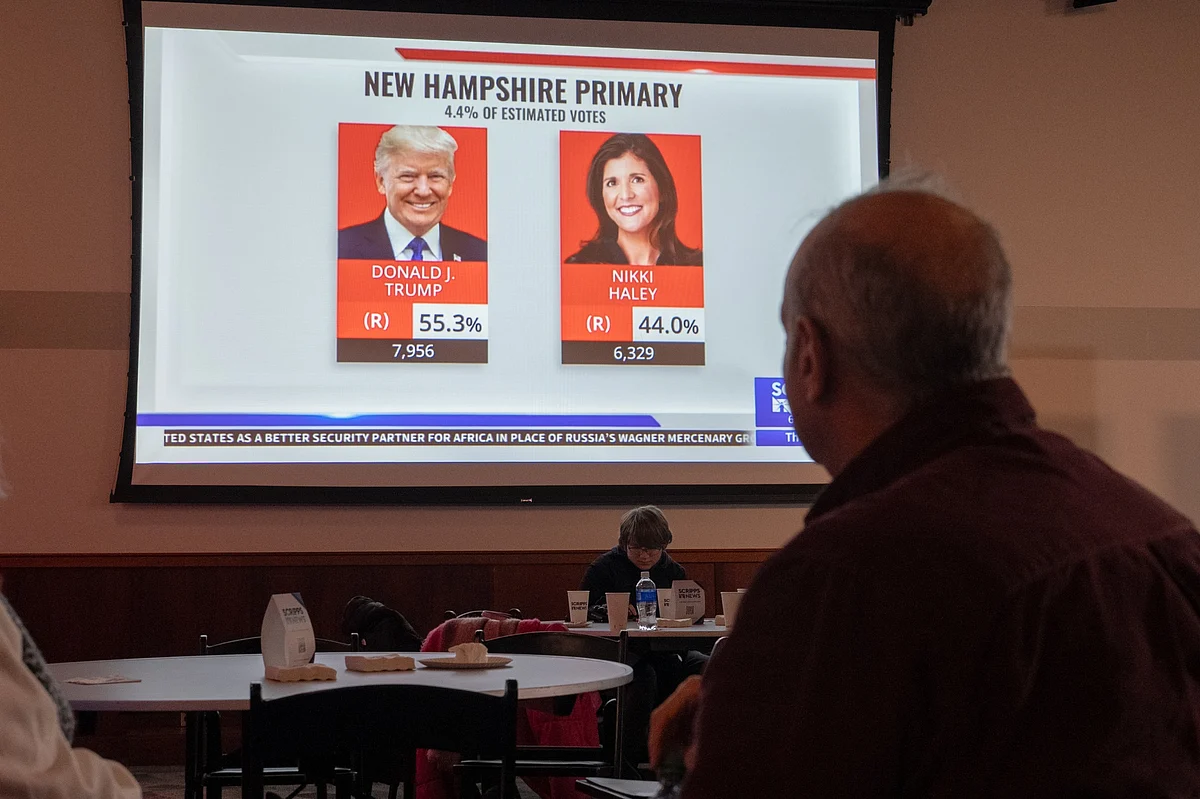 Attendees watch election results during a watch party at the New Hampshire Institute of Politics in Manchester, New Hampshire.Photographer: Mel Musto/Bloomberg