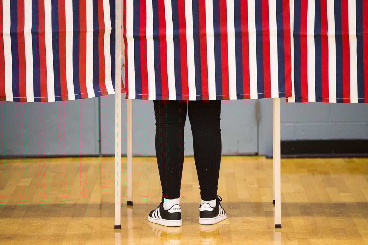 <div class="paragraphs"><p>A voter casts a ballot at a polling station in Oyster River high school in Durham, New Hampshire, U.S., on Tuesday, Feb. 11, 2020. Photographer: Adam Glanzman/Bloomberg</p></div>