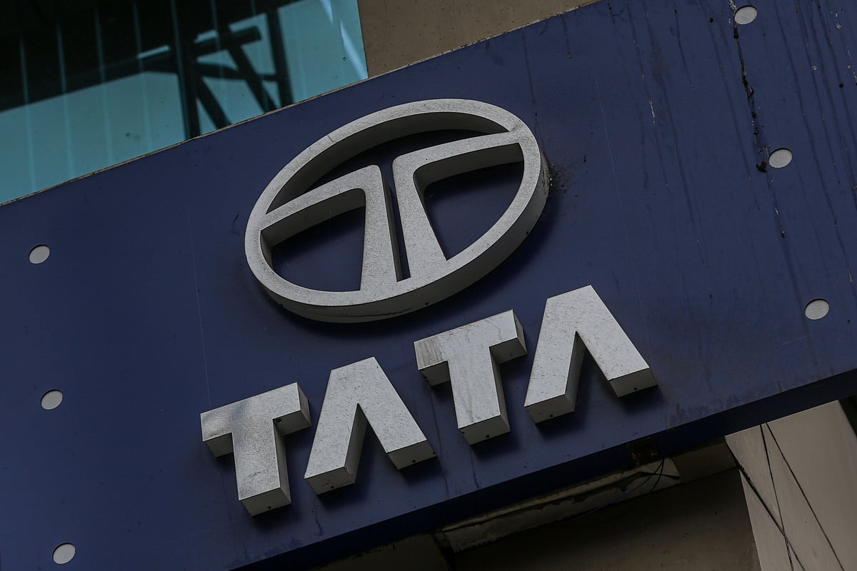 Tata Group's logo displayed at Tata Motors Ltd., dealership in Mumbai, India, on Tuesday, July 26, 2022. Tata Motors is expected to report results on July 27.