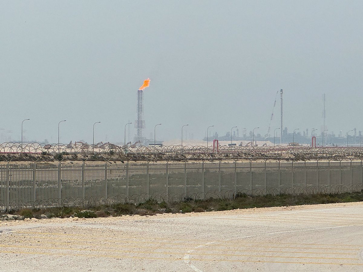 QatarEnergy’s LNG site is ringed by barbed-wire-topped chain link fences.Photographer: Anthony Di Paola/Bloomberg