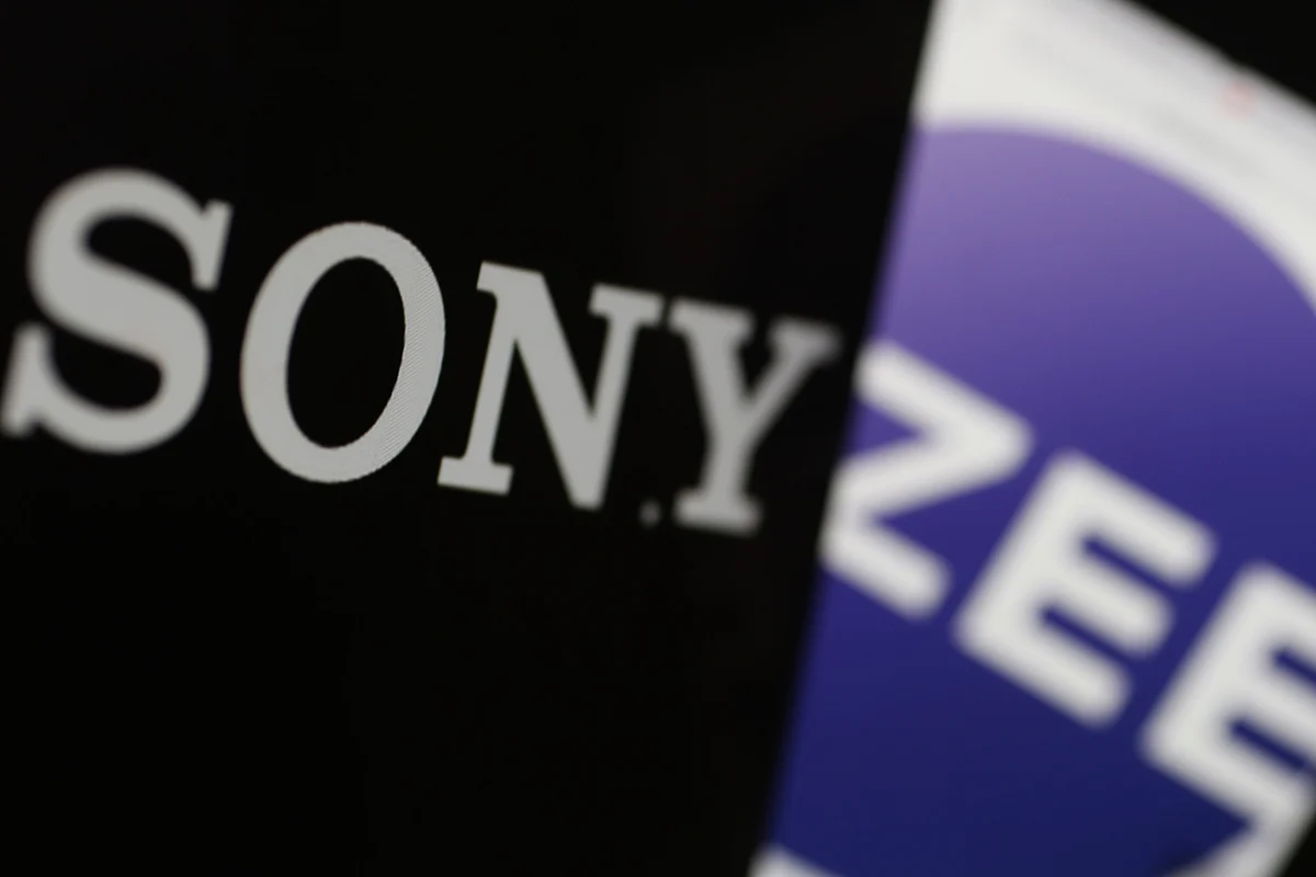 Logos of Sony Group Corp., left, and Zee Entertainment Enterprises Ltd., right, displayed on computer screens arranged in Mumbai, India, on Jan. 9, 2024. Photographer: Dhiraj Singh/Bloomberg