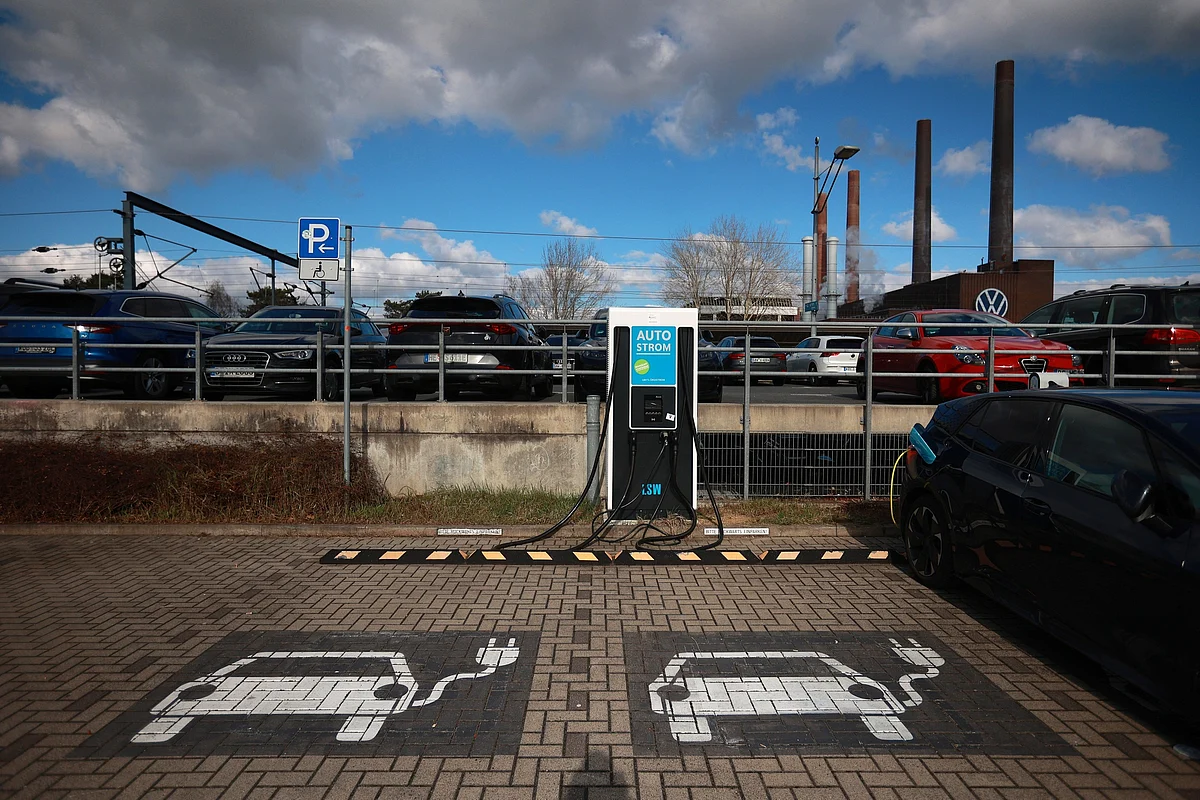Electric vehicle charging stations in the parking lot of a train station near the Volkswagen AG headquarters in Wolfsburg.Photographer: Krisztian Bocsi/Bloomberg