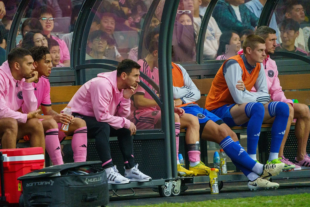 Lionel Messi, third left, on the bench on Feb. 4.Photographer: Justin Chin/Bloomberg