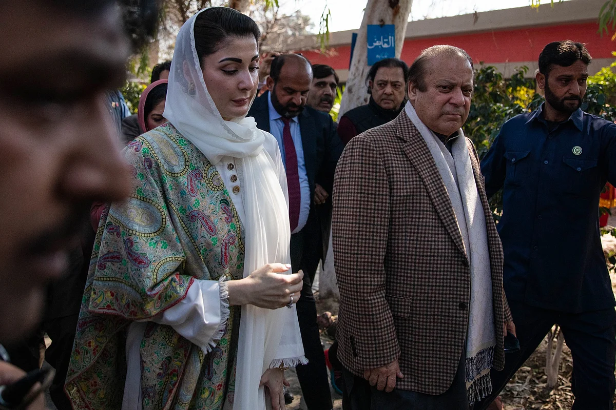 Nawaz Sharif, right, and his daughter Maryam Nawaz Sharif arrive at a polling station in Lahore.Photographer: Betsy Joles/Bloomberg