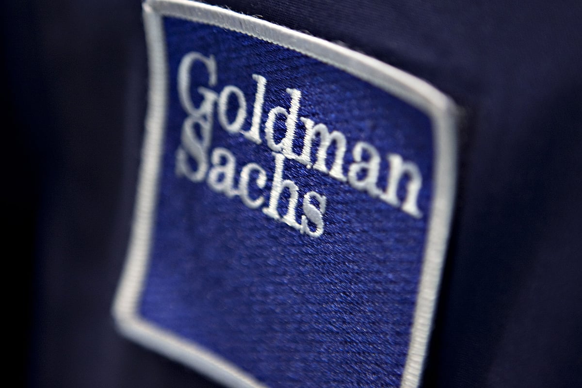 <div class="paragraphs"><p>A patch bearing the Goldman Sachs logo on a trading jacket on the floor of the New York Stock Exchange in New York, U.S. (Source: Daniel Acker/Bloomberg)</p></div>