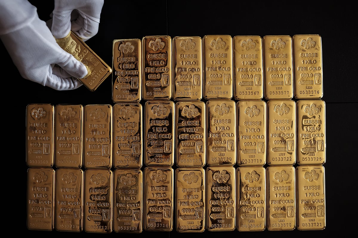 Gold Steady After Surging To Record On Rate-Cut Bets, Haven Bids