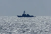 The USS Mason destroyer ship patrols near the USS Dwight D. Eisenhower (CVN 69) aircraft carrier during operations in the southern Red Sea, on Wednesday, March 20, 2024. Houthi militants started attacking Red Sea shipping in November 2023, ostensibly as a means of pressuring Israel to end its war in Gaza against Hamas, with the US and UK responding with airstrikes including the use of jets from the USS Eisenhower against the Houthis' military assets. Photographer: Christopher Pike/Bloomberg