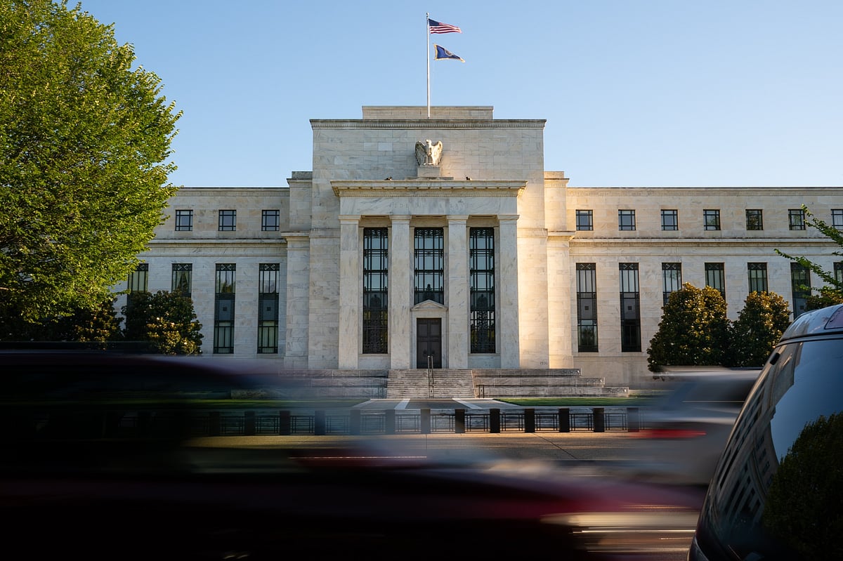 Traffic passes the Marriner S. Eccles Federal Reserve building in Washington, D.