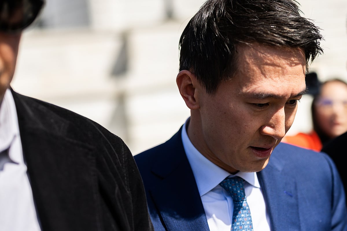 Shou Zi Chew, chief executive officer of TikTok Inc., right, departs the Capitol following a meeting with Senator John Fetterman.Photographer: Tierney L. Cross/Bloomberg