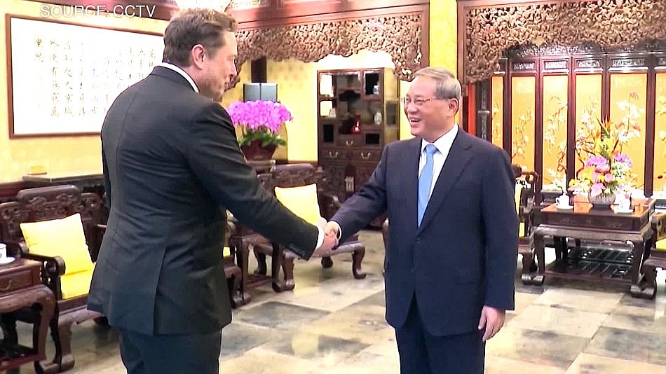 WATCH: Elon Musk met with Chinese Premier Li Qiang in Beijing on Sunday during his unannounced trip to China.Source: CCTV via APTN