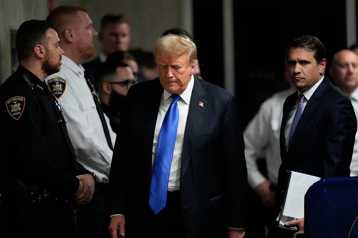 Donald Trump walks to speak to the media after the verdict was read at Manhattan Criminal Court on May 30.Photographer: Seth Wenig/Pool/Getty Images