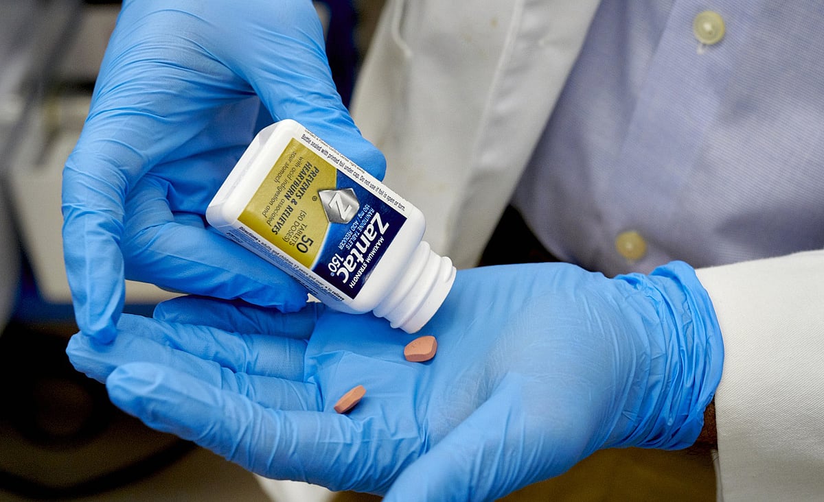 Testing a bottle of Zantac.Photographer: Gabby Jones/Bloomberg