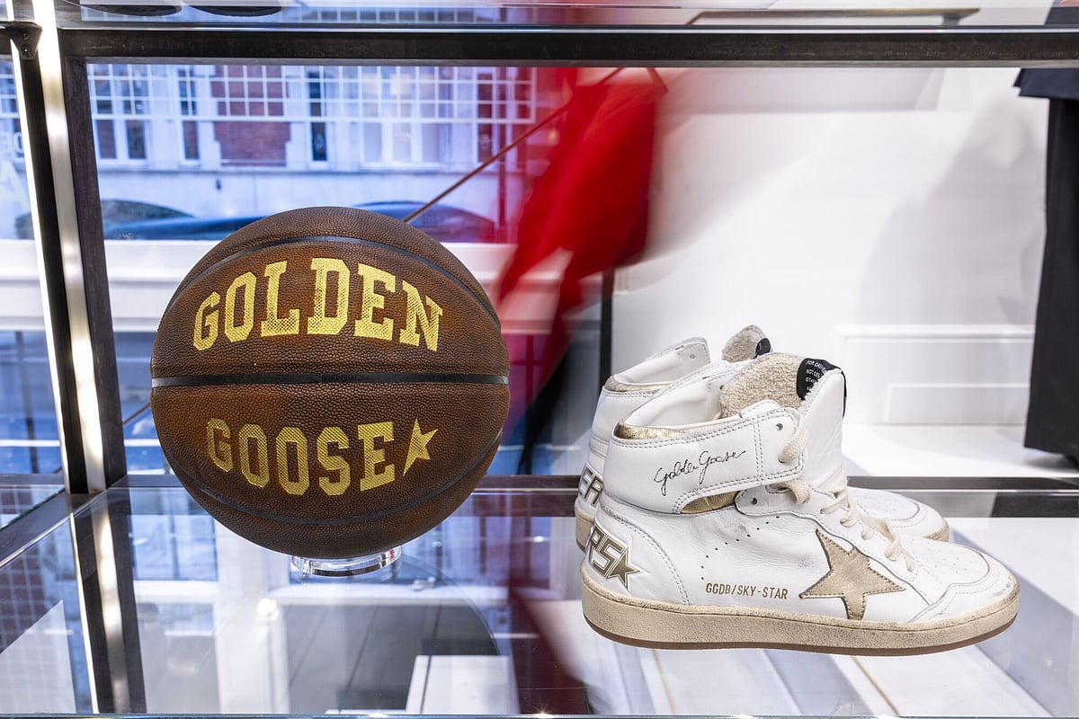 A pair of Golden Goose sneakers.