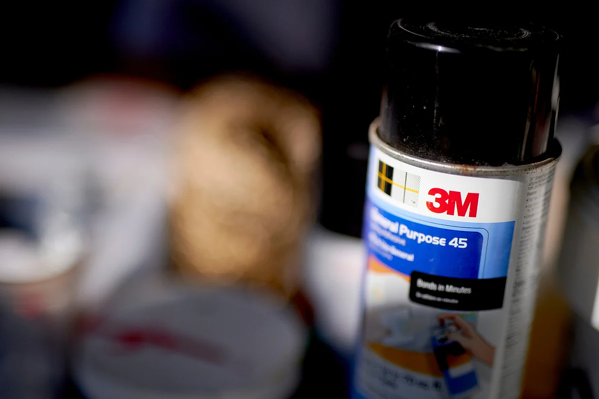 3M adhesive spray arranged for a photograph in Germantown, New York. The company adjusted its net income for 2023 for a $11.6 billion litigation expense.Photographer: Gabby Jones/Bloomberg