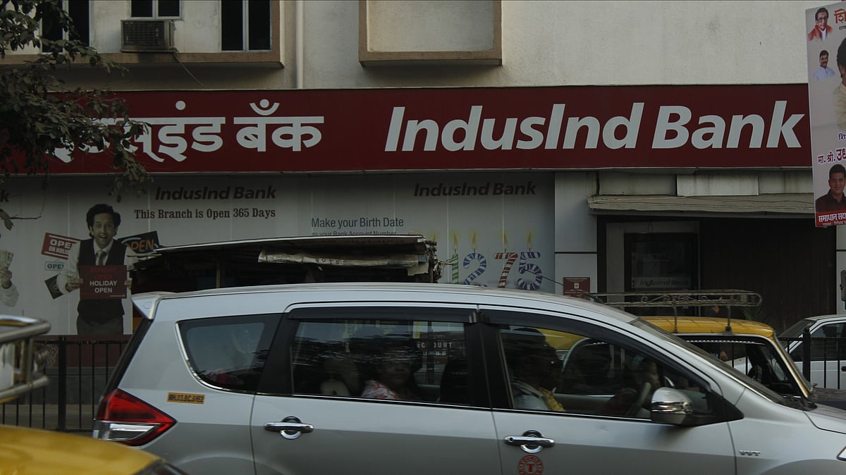 <div class="paragraphs"><p>IndusInd Bank reported a 39% drop in net profit for the July-September quarter, driven by a sharp 73% increase in provisions compared to the previous year. The gross NPA ratio worsened slightly, reflecting asset quality challenges. (Vehicles pass by an IndusInd Bank branch at Prabhadevi, Mumbai, India. Photo source: Anirudh Saligrama/NDTV Profit)</p></div>