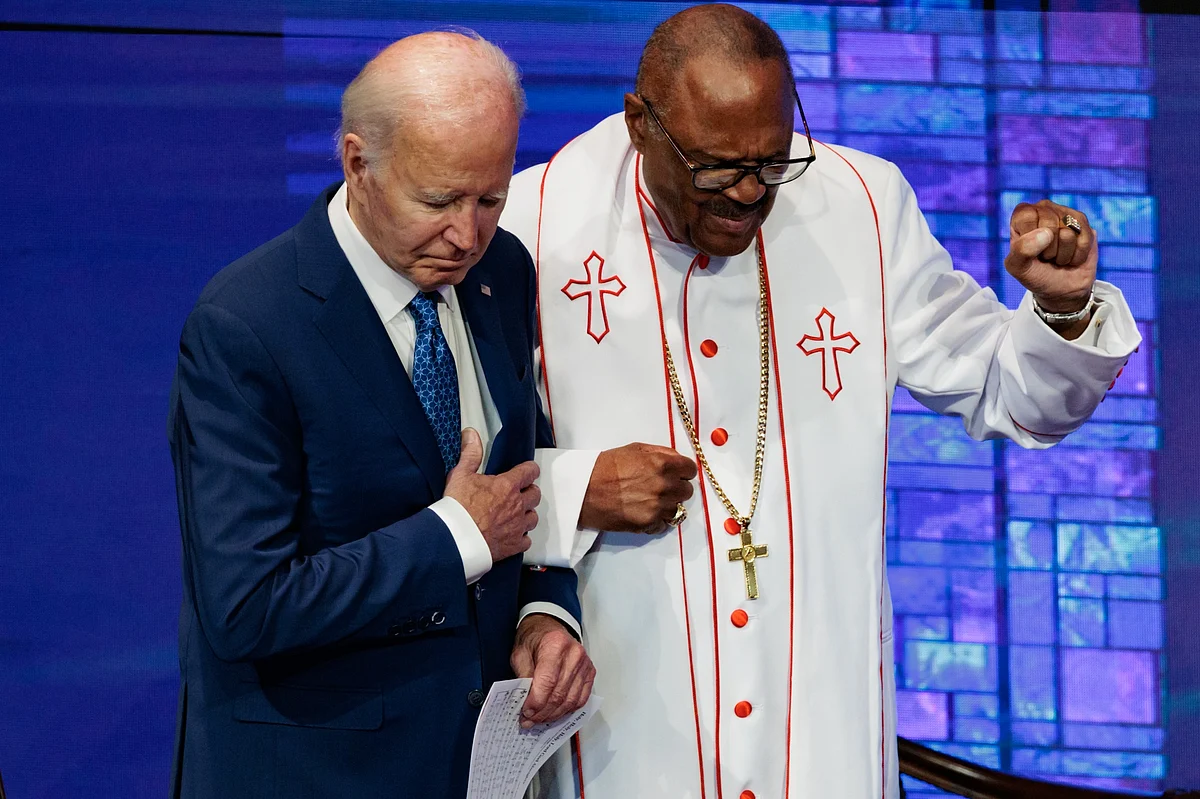 US President Joe Biden, left, with Bishop Ernest C. Morris Sr. at Mt. Airy Church of God in Christ in Philadelphia on July 7.Photographer: Hannah Beier/Bloomberg