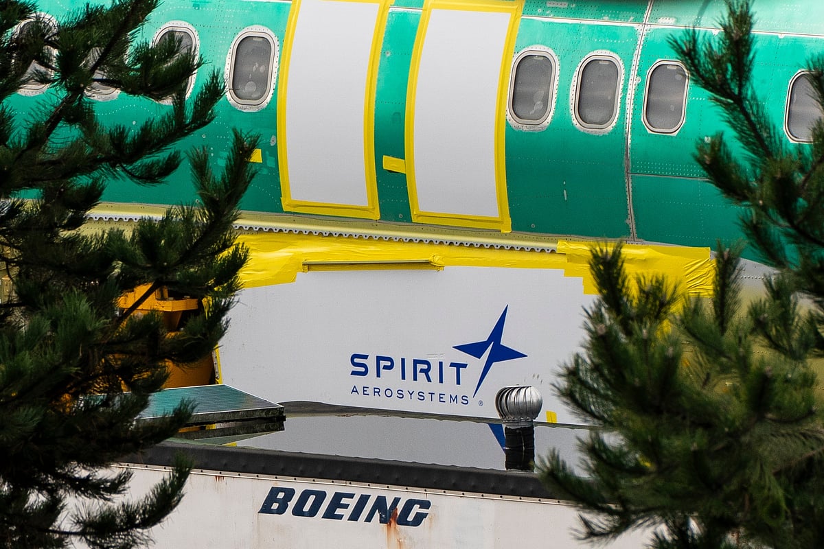 Spirit AeroSystems signage near a Boeing 737 Max 8 aircraft fuselage outside the Boeing manufacturing facility in Renton, Washington.Photographer: David Ryder/Bloomberg