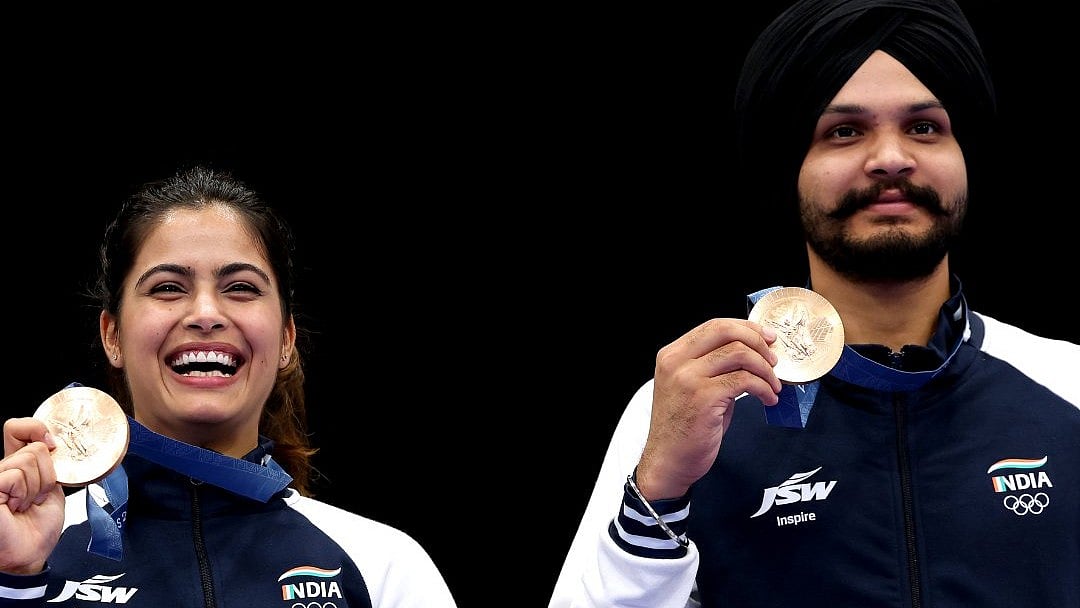 <div class="paragraphs"><p>Manu Bhaker and Sarabjot Singh with their bronze medals at the Paris Olympics 2024 (Source: Olympic Khel/X)&nbsp;</p></div>