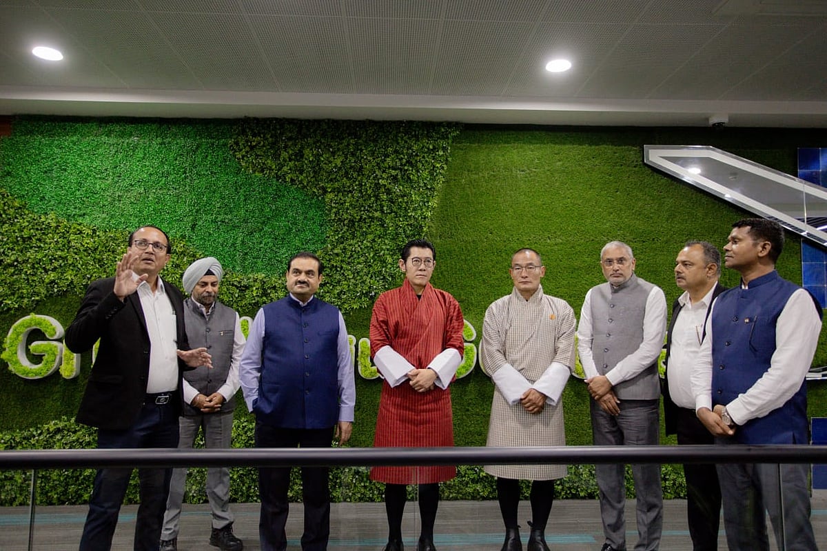 <div class="paragraphs"><p>Bhutan PM&nbsp;Tshering Tobgay and Bhutan's King&nbsp;Jigme Khesar Namgyel Wangchuck being shown around the site. (Source: Adani Green Energy Ltd.)</p></div>
