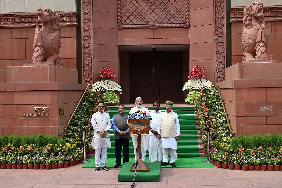 Narendra Modi, center, at the Parliament House in New Delhi in June.Photographer: Prakash Singh/Bloomberg