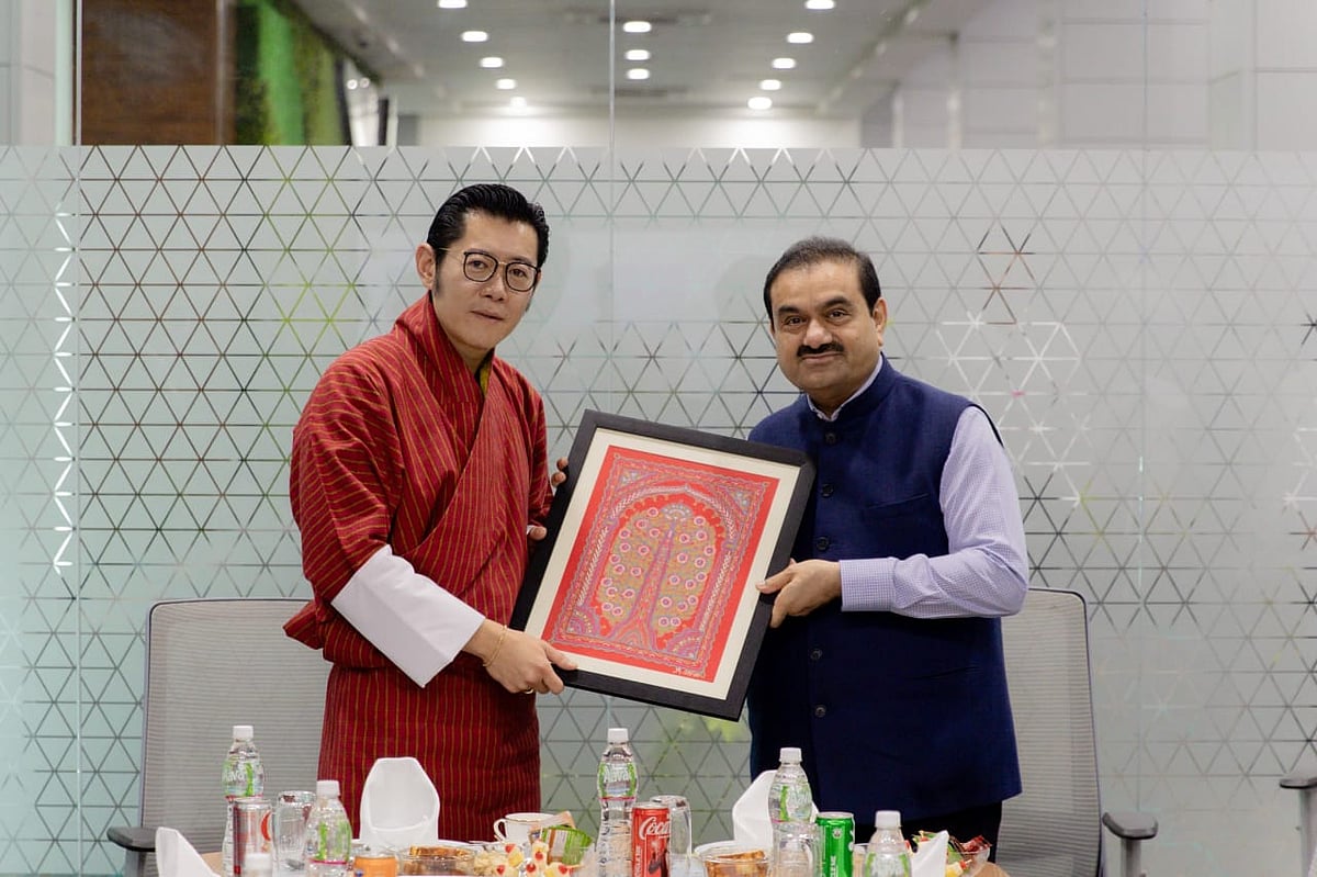 <div class="paragraphs"><p>Billionaire Gautam Adani with Bhutan's King&nbsp;Jigme Khesar Namgyel Wangchuck (Source: Adani Green Energy Ltd.)</p></div>