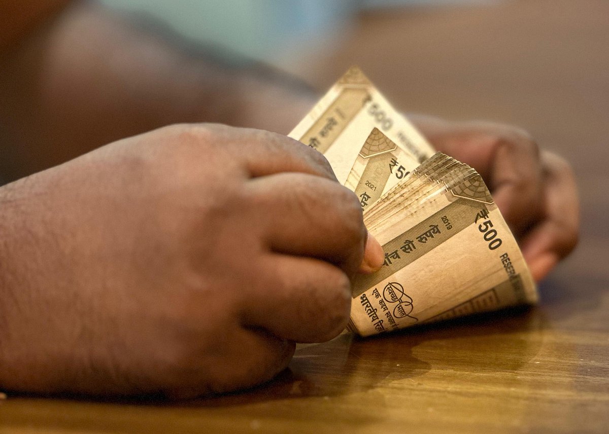 <div class="paragraphs"><p>Close view of a person counting Indian currency 500 rupee notes  (Photo: Radhakisan Raswe/ Source: NDTV Profit).</p></div>