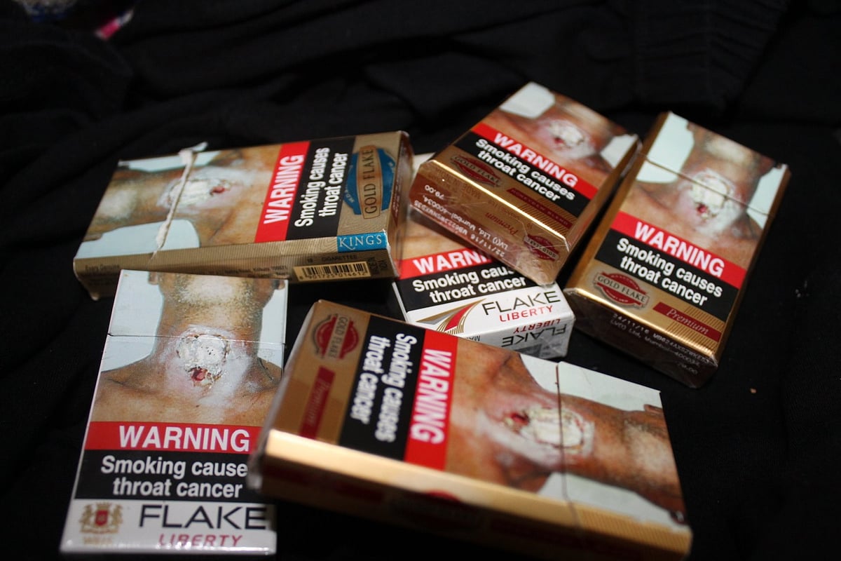 <div class="paragraphs"><p>ITC Ltd's Q3 revenue growth was driven by a strong performance across its FMCG, hospitality, and paperboards businesses, although the company's margin contracted by 216 basis points to 31.86%. (Boxes of ITC’s tobacco cigarette brand, Gold Flake, are displayed for a picture in Mumbai, India. Photo source: NDTV Profit)</p></div>