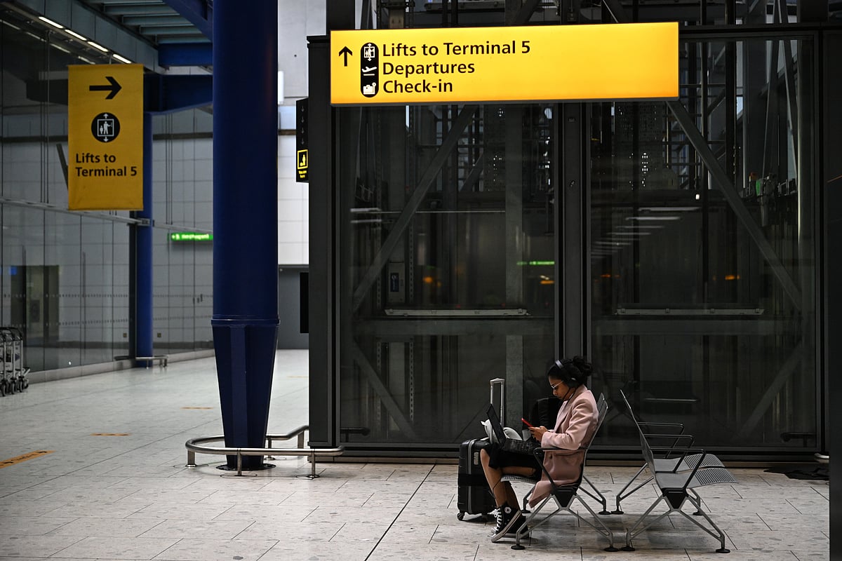 <div class="paragraphs"><p>A traveler at Terminal 5 on March 21.</p></div>