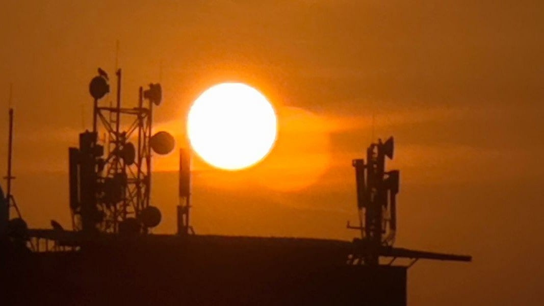 <div class="paragraphs"><p>Silhouette of sunrise behind the telecom towers (Photo: Vijay Sartape/NDTV Profit)</p></div>